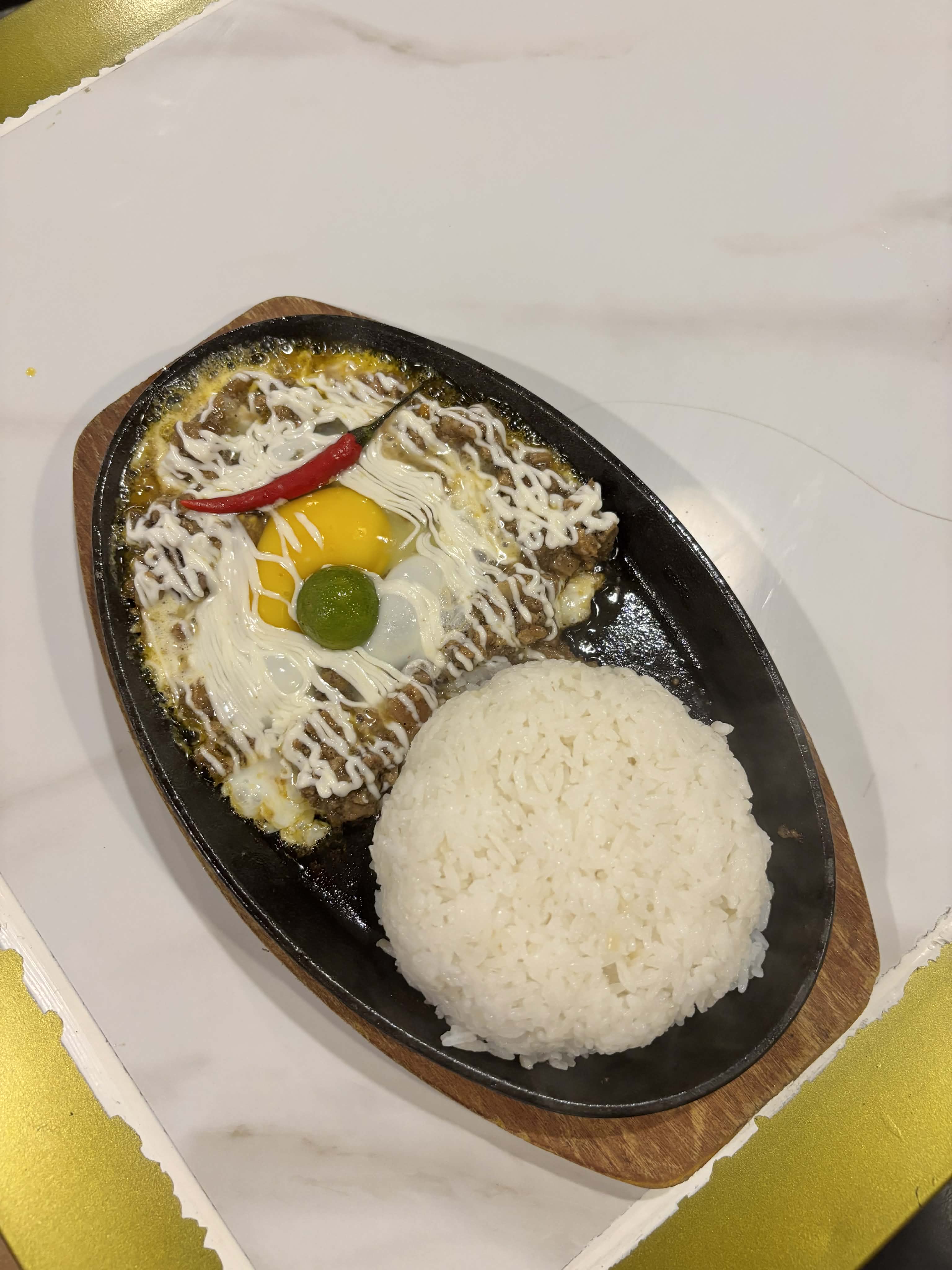 RM1 Sizzling Pork Sisig
